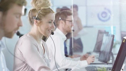  Friendly customer service operators taking calls in busy call center - Powered by Adobe