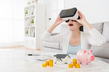 cheerful pretty girl wearing VR technology goggles