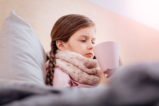 Unhappy Girl Drinking Useful Tasteless Tea