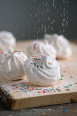 White Russian marshmallows on wooden cutting board