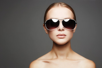 beautiful young woman in sunglasses