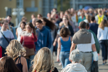 Crowd of people on the street. No recognizable faces