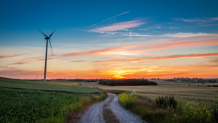 Stunning dusk with wind turbines as alternative energy © shaiith