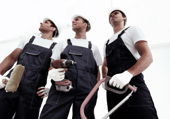 Group of professional industrial workers. Isolated over white background.