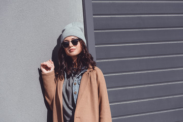  Woman in autumn outfit and black sunglasses