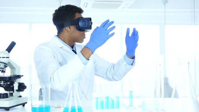 Scientist Using virtual reality glasses for Research and imagination in Laboratory, Vr Goggles