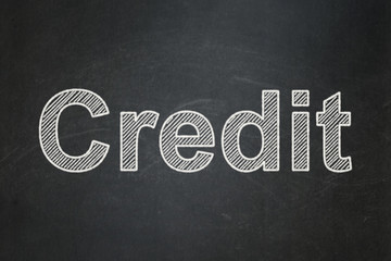 Obraz premium Business concept: Credit on chalkboard background
