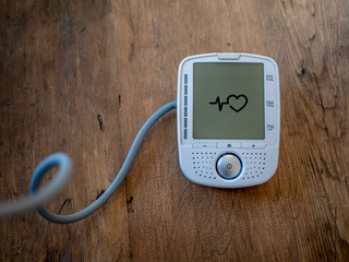 Digital device for measure blood pressure and pulse. Modern healthcare at home.