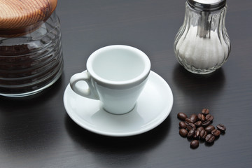 pile of coffee beans and a cup