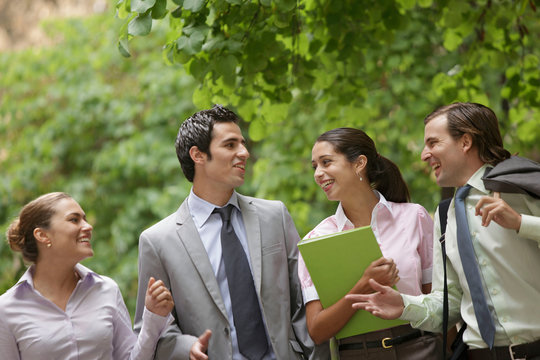 Business team talking on street