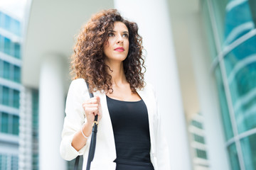 Businesswoman walking outdoors