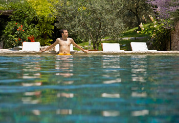 Man wading in the pool