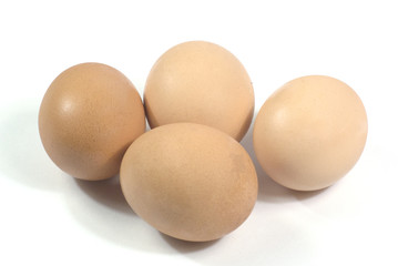 Close-up four eggs isolated on white background with clipping path.