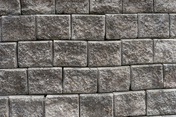 Old grungy gray brick wall texture