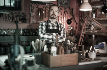 Male worker in leather workshop