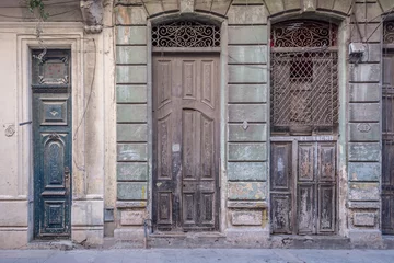 Velvet curtains Old door Three tall old vintage hispanic doors at Havana, Cuba