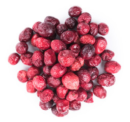 Dried Cranberries isolated on white background (selective focus; close-up shot)