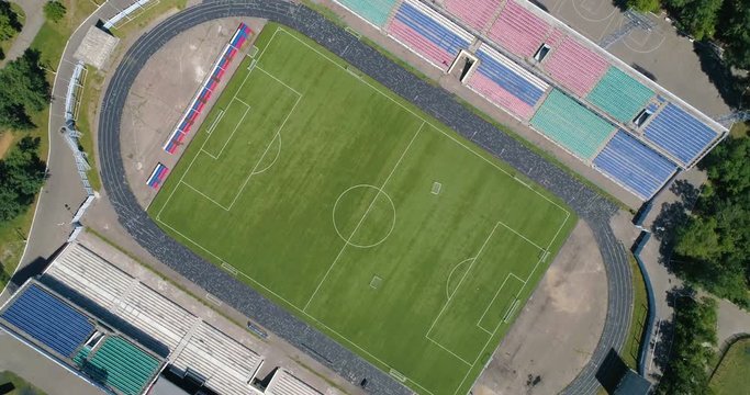 Classical empty old stadium from birds eye view. Aerial footage.