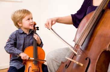woman and boy playing Cello © Image Source RF