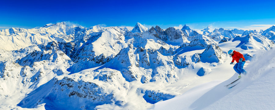Skiing with amazing view of swiss famous mountains in beautiful winter snow  Mt Fort. The matterhorn and the Dent d'Herens. In the foreground the Grand Desert glacier.