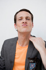 man showing a gesture to viewer