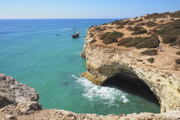 Obraz premium A view of a Praia da Rocha in Portimao, Algarve region, Portugal