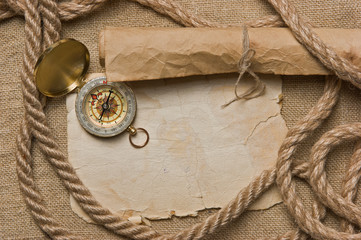 old paper with compass and rope