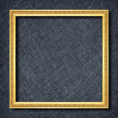 Fototapeta premium gold frame on Dark grey black slate background or texture.