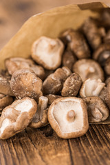 Portion of Raw Shiitake mushrooms, selective focus