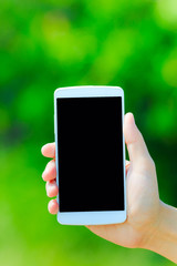 スマートフォンと緑背景