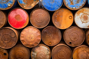 Old rusty oil barrels. Industrial background.