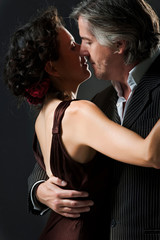 man & woman dancing tango