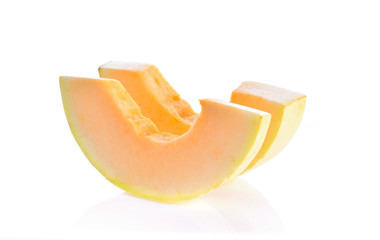 pieces of Cantaloupe on white background