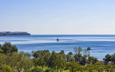 Fototapeta na wymiar Panoramic view on Antalya city and Mediterranean Sea from the Beach park. Antalya, Turkey