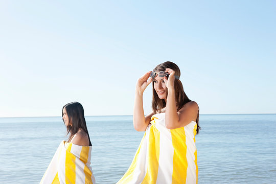 Female Bathers Looking Out To Sea