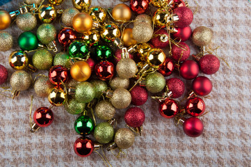 Christmas decoration balls on plaid background