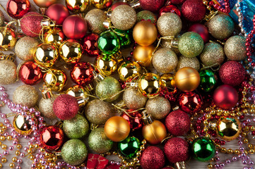 Red, yellow, green, gold glossy christmas decoration balls