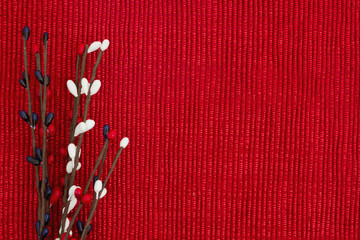 Red, white and blue pip floral berry spray on a shiny red material