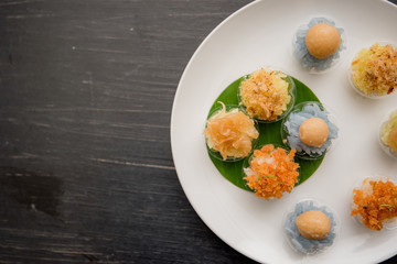 ancient Thai Dessert, Thai sweet dessert and ingredient in bowl on black background, appetizer, Thai Dessert, Thai food