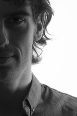 Obraz premium Portrait of young anonymous man with backlighting