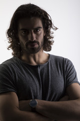 Portrait of young man with long hair.