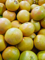 counter with red grapefruits