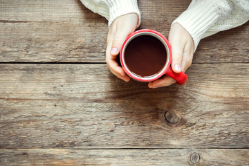 Hot chocolate in hands