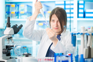 Fototapeta premium young woman lab assistant in a genetics lab