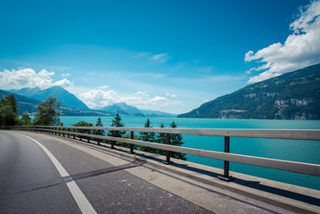 gorgeous scenery view of lakeside road in the Alpines with beautiful lake in Switzerland