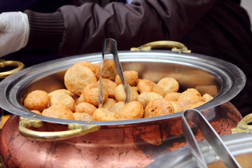 Delicious Indian cuisine in the Indian bazaar is presented from the  restaurant..