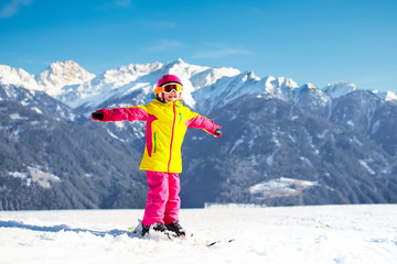 Kids winter snow sport. Children ski. Family skiing.
