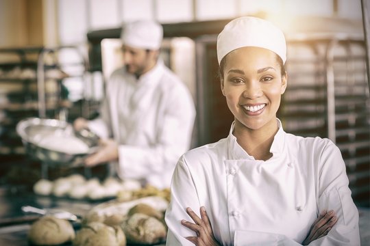 Happy Female Baker Smiling At Camera