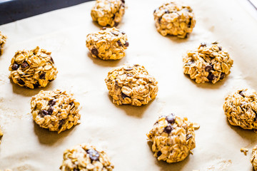 Homemade Raw Cookie Dough on a Baking Tray with Parchment Paper, Horizontal View