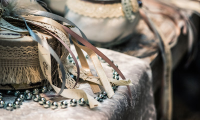 Christmas and New Year background with toys, candles, artificial snow, shiny beads, and other decoration elements.